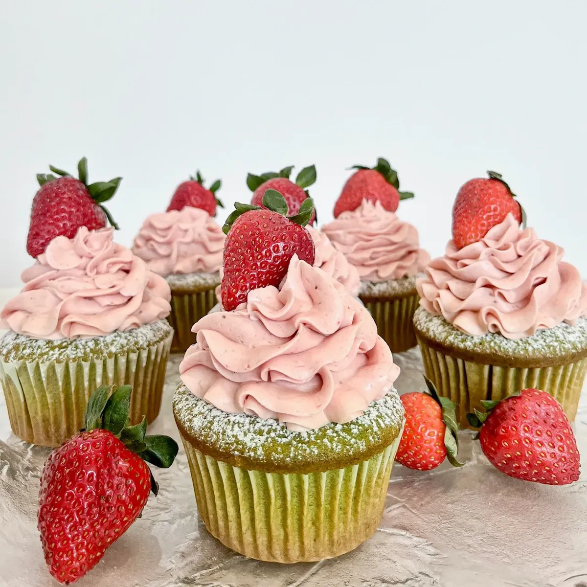 Strawberry cupcakes with pink frosting